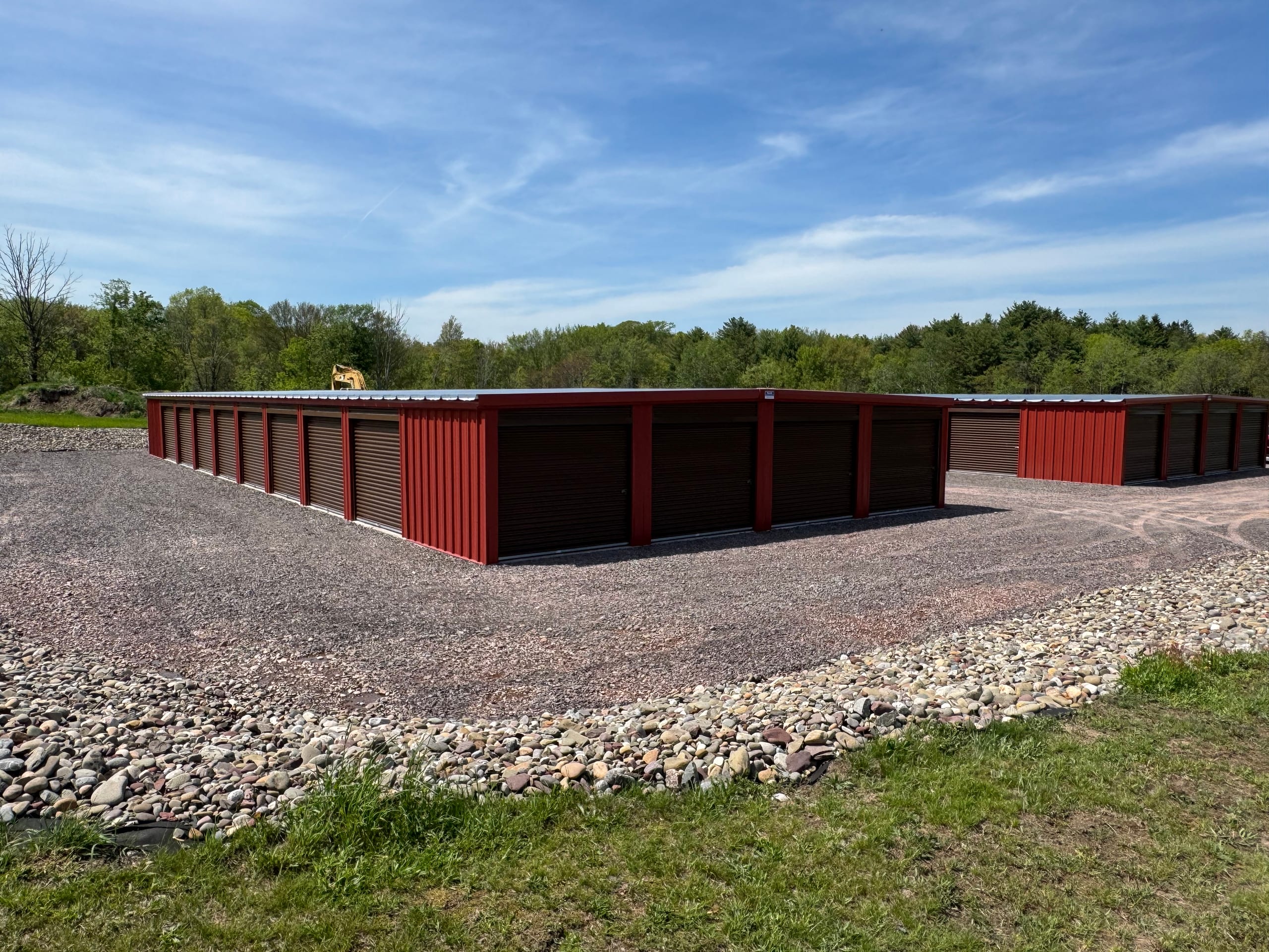 Rows of red drive-up storage units at Greystone Storage of Sweet Valley